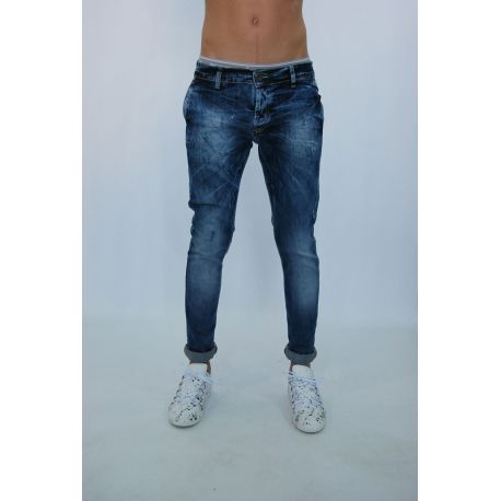 JEANS ELAST CON BOLSILLO ÚNICO HILO LAVAG LUZ AZUL