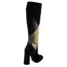 Boot in black suede with details in black leather and gold